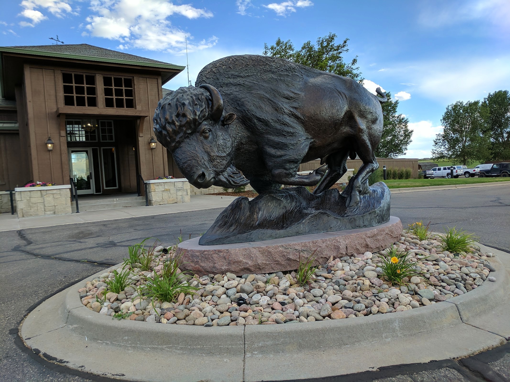 Bronze buffalo sculpture at Buffalo Run entrance