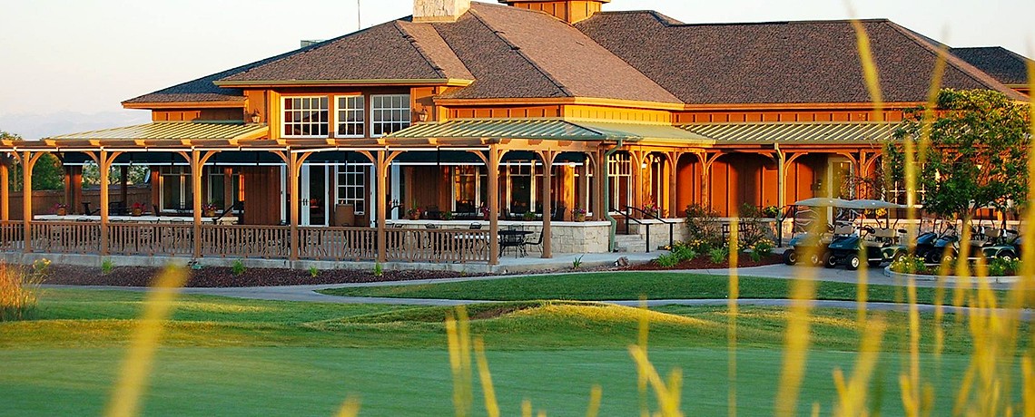 Buffalo Run clubhouse exterior at golden hour